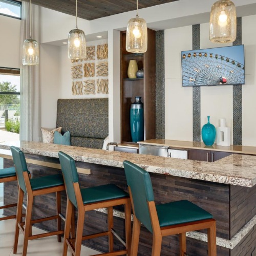 a kitchen with a table and chairs