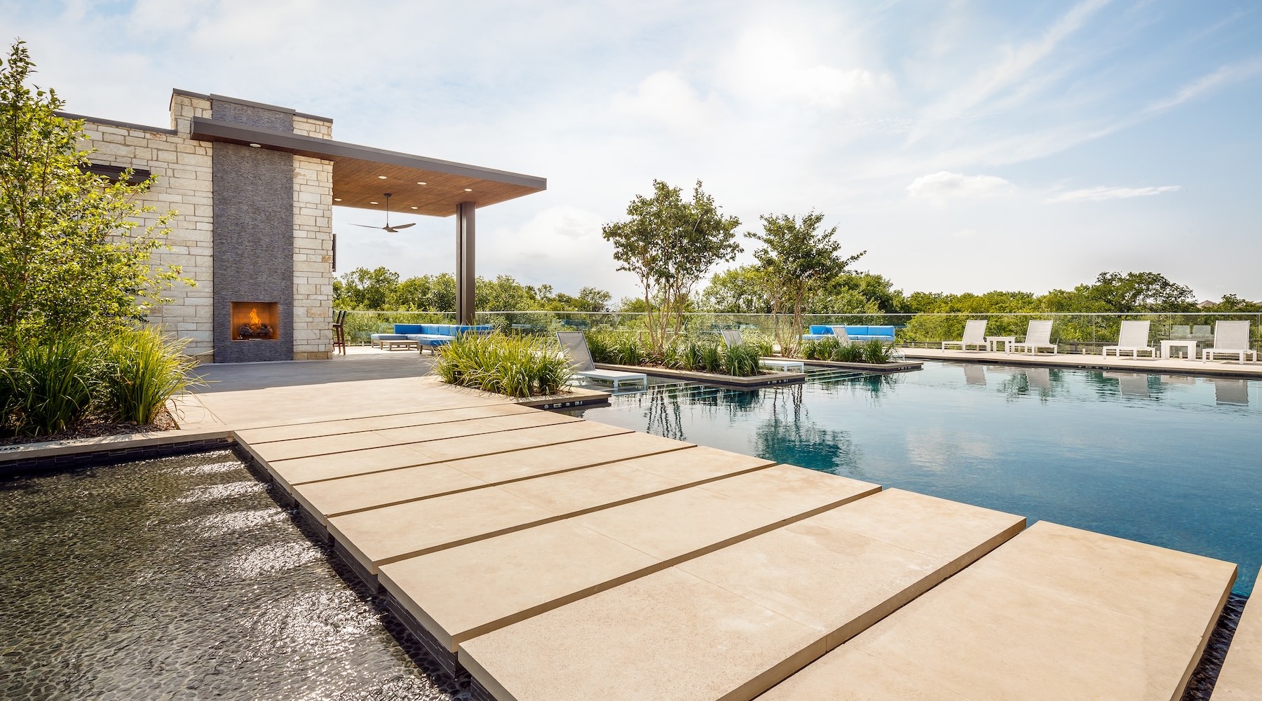 a pool with a building in the background